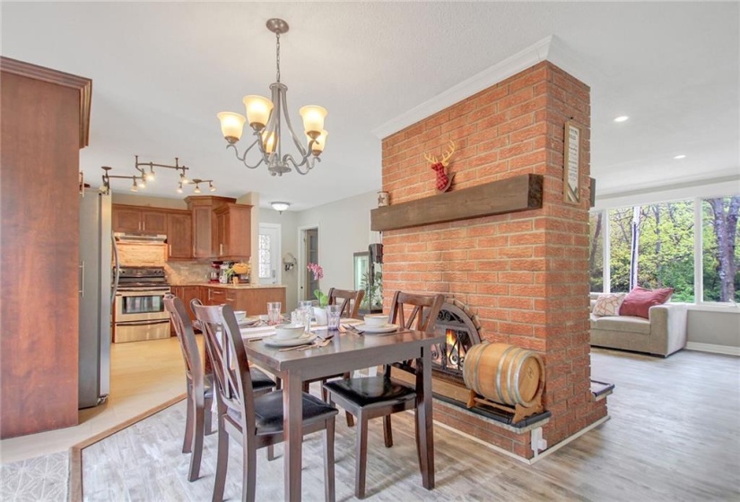 Dining Room with a cozy fireplace