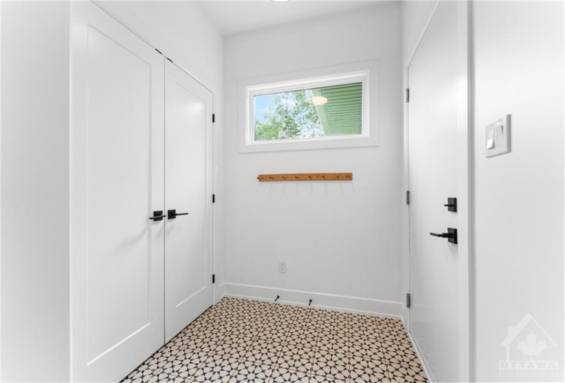 Mudroom off the Garage w/Funky Tile & Window