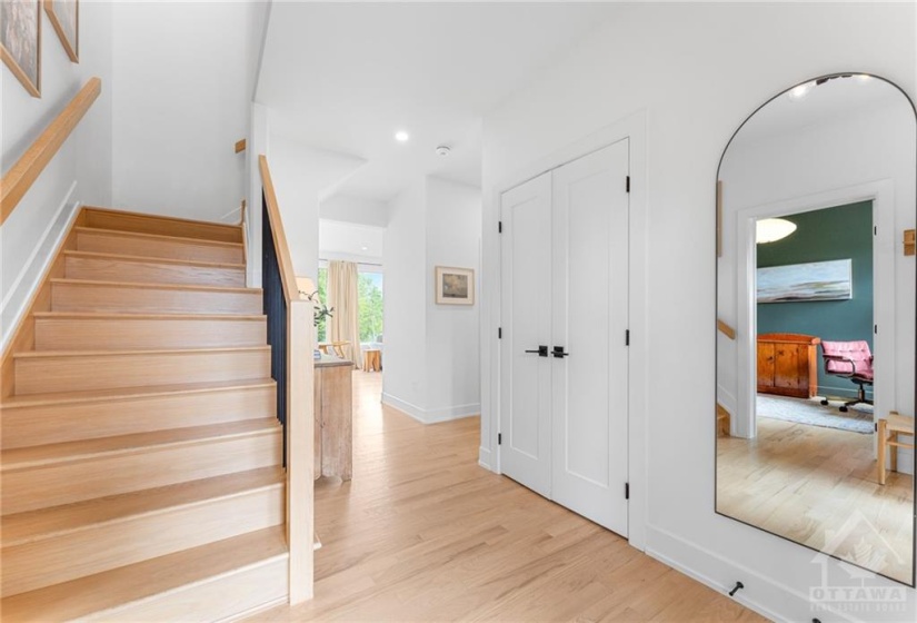 Hardwood on Stairs w/Iron Spindles lead to 2nd Level w/Hardwood Landing