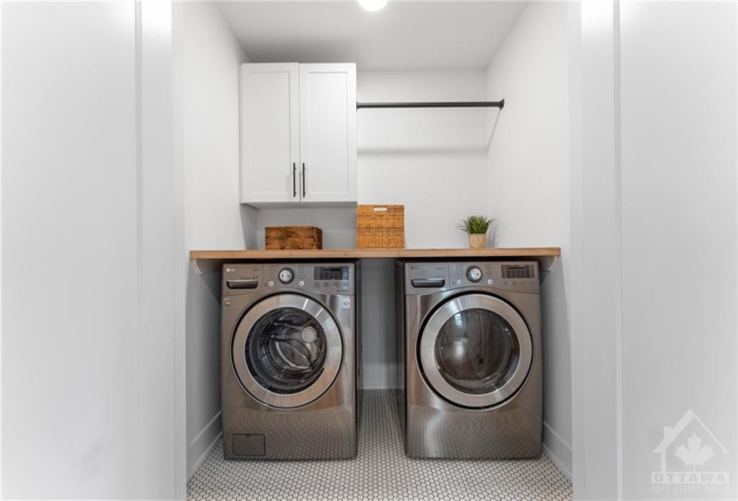 Convenient 2nd Level Laundry w/Modern Tile, Wood Folding Top & Hanger w/Storage