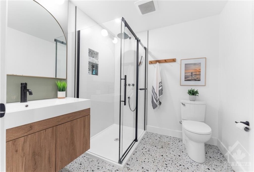 Ultra Modern 3PC Bath w/Floating Vanity, Large Glass Shower w/Large White Tiles & Funky Tiled Floors