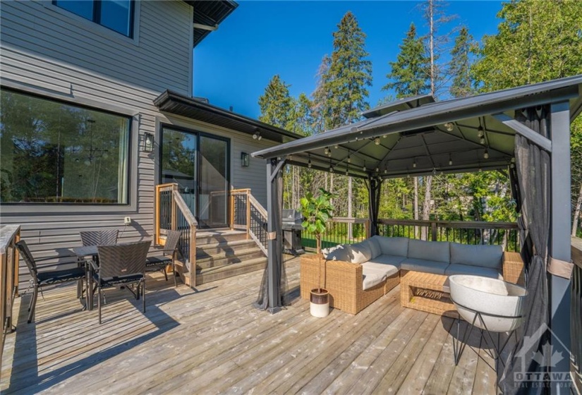 Patio Doors Lead to the Great Size Deck w/Gazebo w/Lights, perfect for entertaining