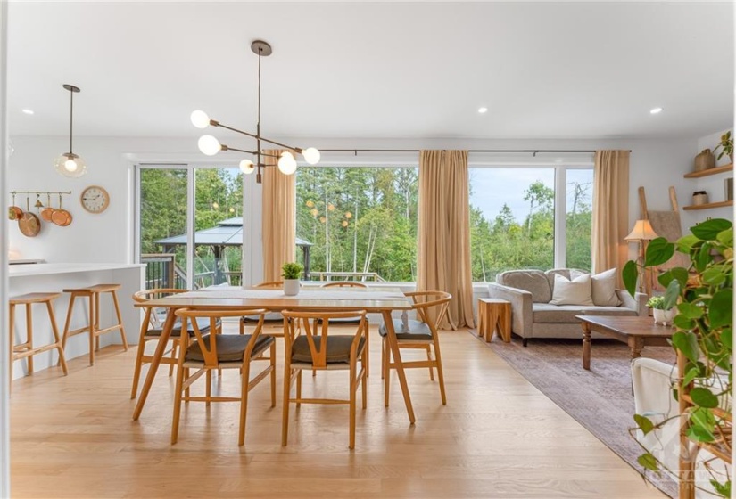 Open Concept Kitchen/Dining & Living Room Area w/Gleaming Hardwood & Tons of Natural Light w/Wall- to- Wall Windows!