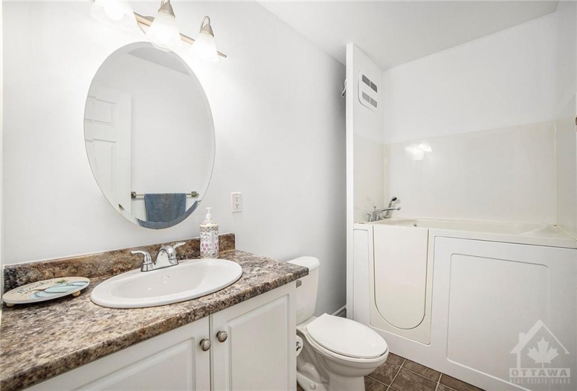 Main Bath with walk-in tub.