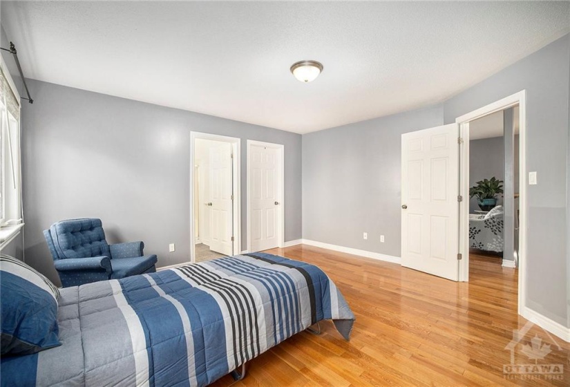 Primary Bedroom with walk-in closet