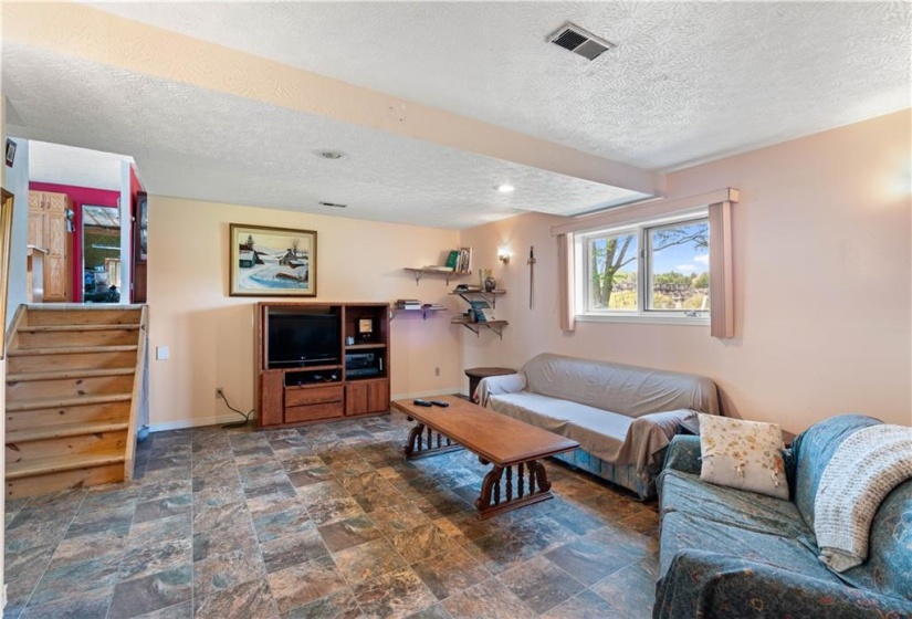 Family room with newly installed quality vinyl flooring