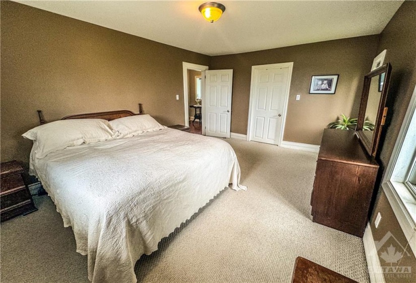 Primary bedroom with large closet.