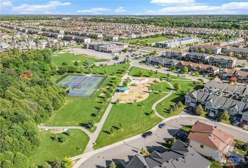 Tennis courts, Park with splash pad & Trails at Mancini Park!