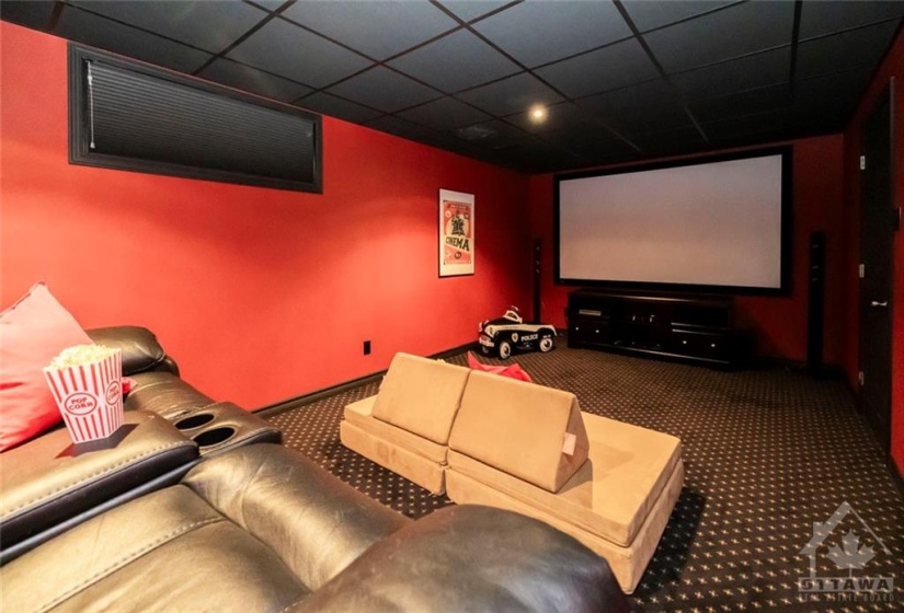 Theatre room; projector, surround sound and screen included