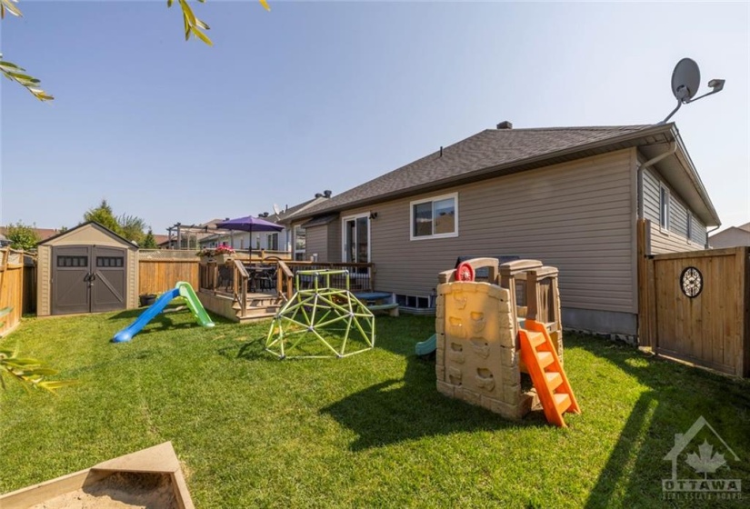 Backyard with deck and shed