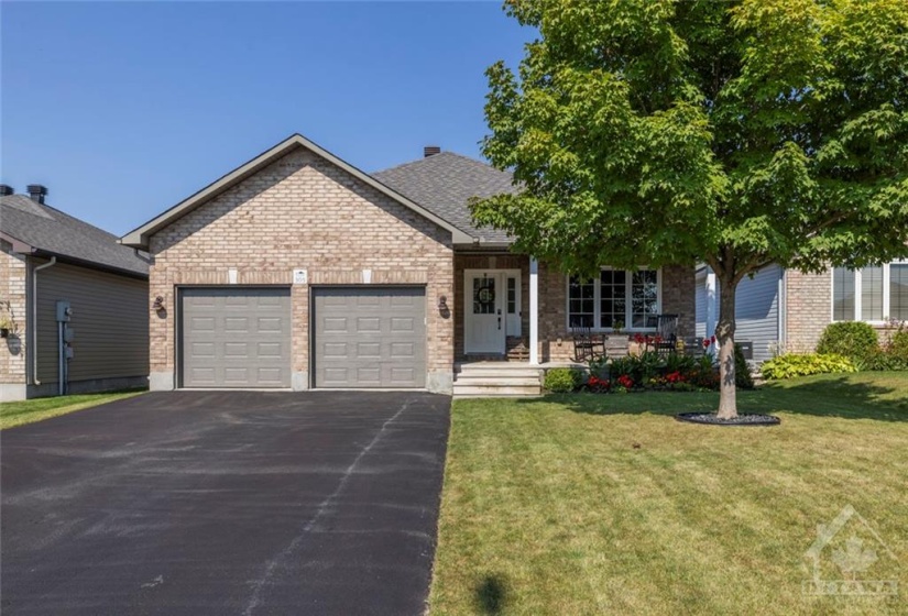 Long driveway to double car garage