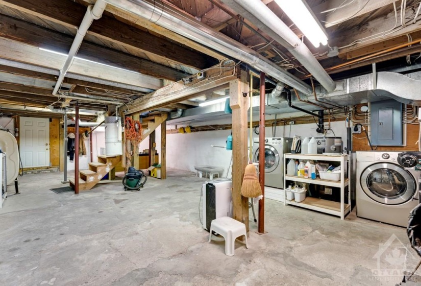 Lower level utility room with laundry station