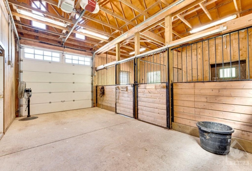 Stable has two rubber matted stalls with heated watr buckets; sand paddocks. Heated tack room with hot/cold running water