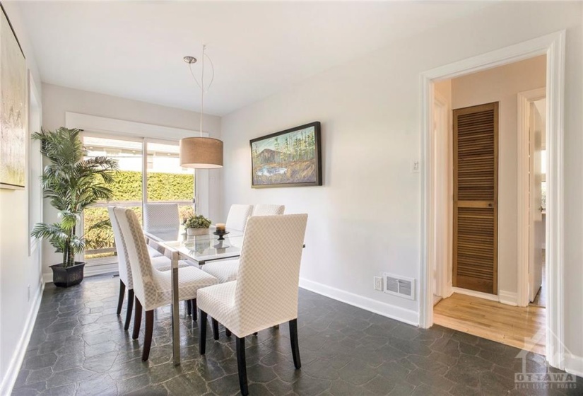 Dining with doorway to the kitchen and hall. In a major, could you move the kitchen here?