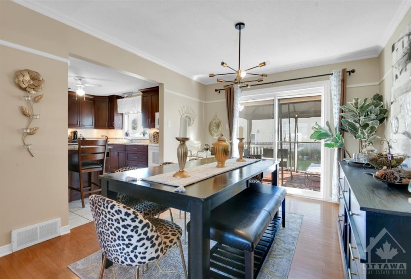 Formal dining area leading to backyard & deck