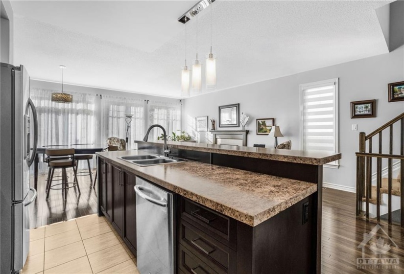 Open concept kitchen overlooking liv/din room