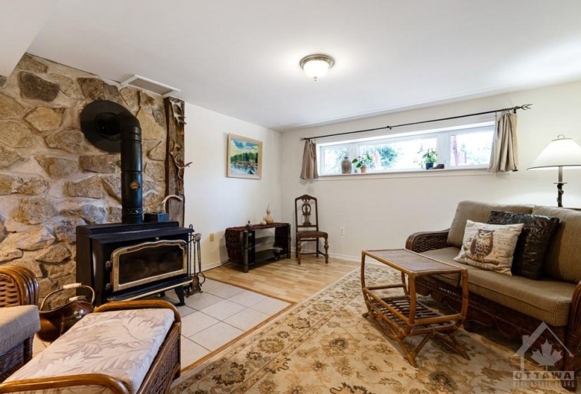 Lower level family room with cozy woodstove