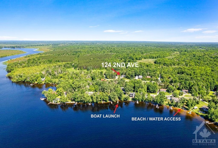 Located in Rothwell Park with short walk to the community's private sandy beach and boat launch