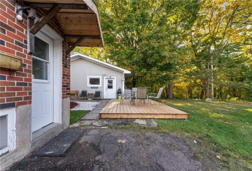 Side entry to access garage. Eating/entertaining deck area.