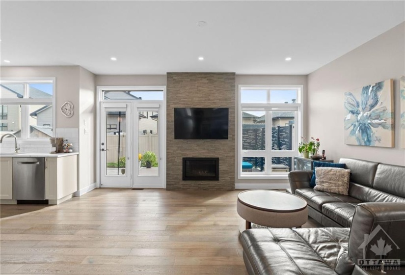 Walkout to back deck off kitchen & living room.