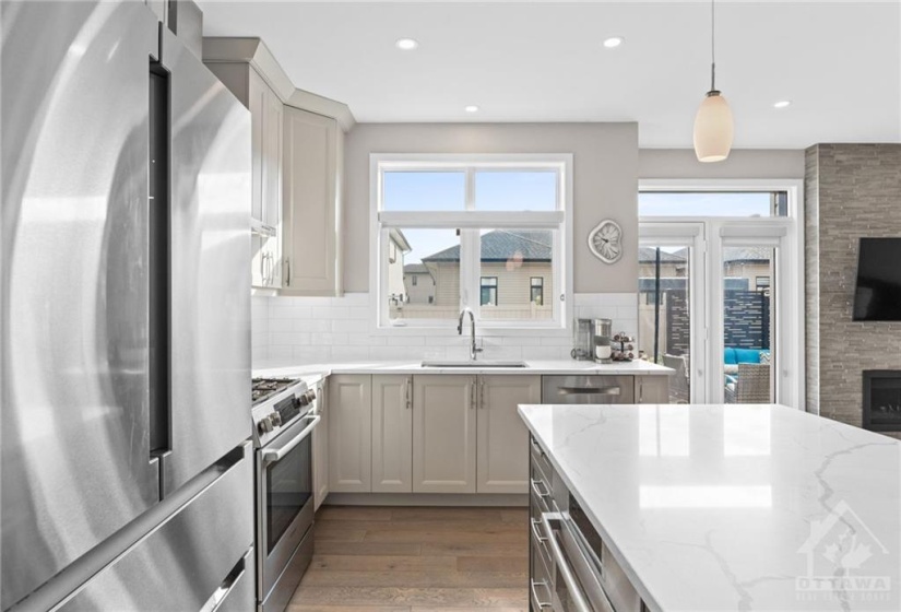 Soft close cabinetry, built in microwave, gas stove and more in this luxury kitchen.