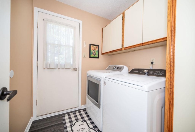 Side door entrance and Laundry Room