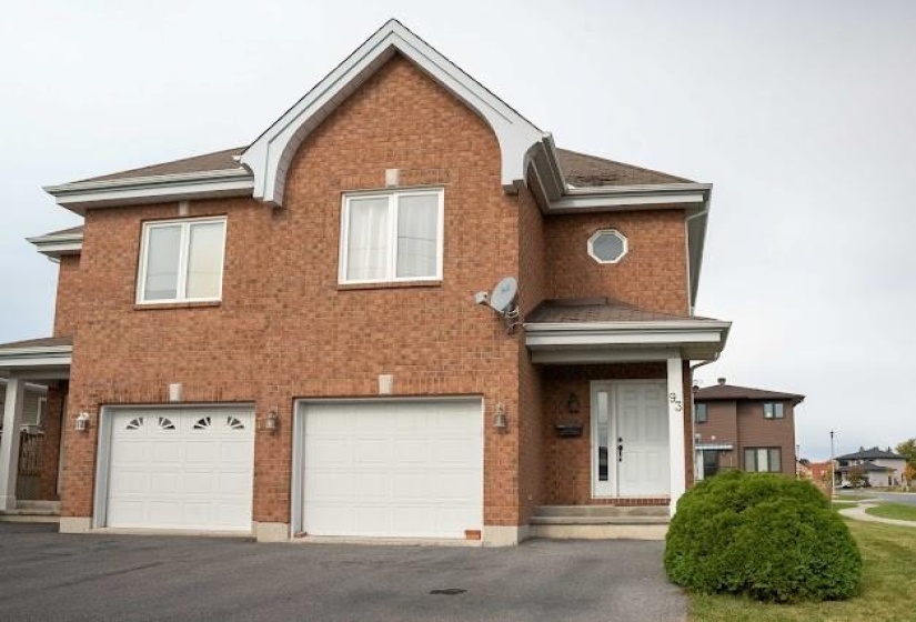 Beautiful 2 story semi detached home with attached garage and 4 additional parking spaces.