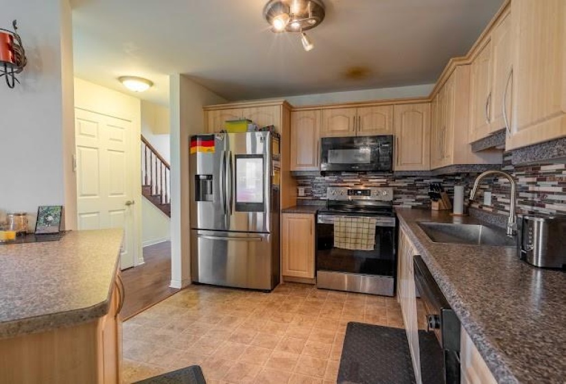 Spacious kitchen - refrigerator, stove and dishwasher included