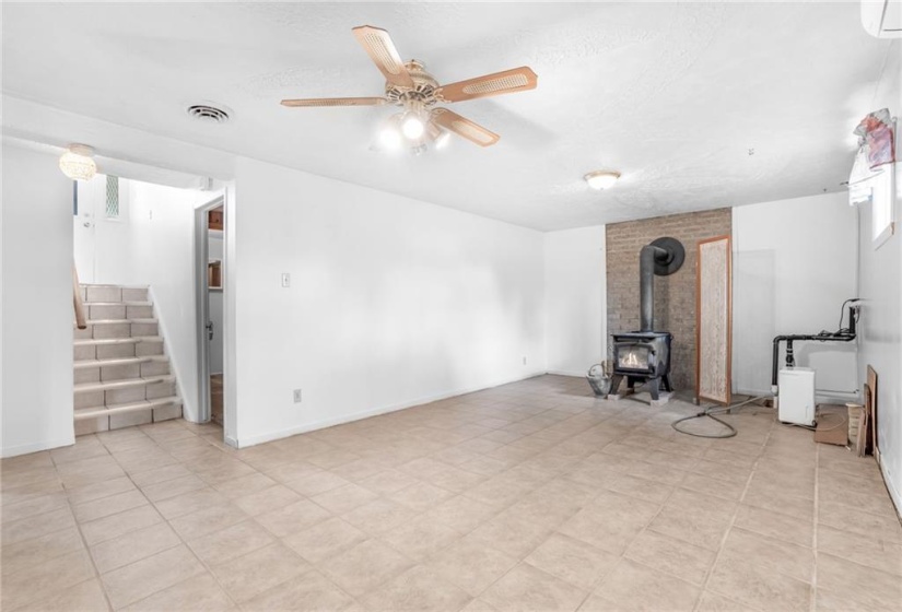 basement family room. ceramic floor