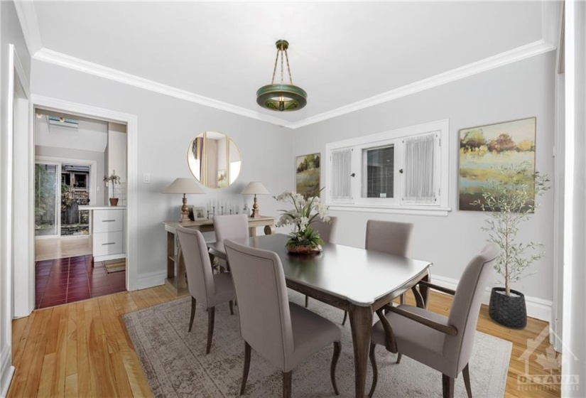 Spacious dining room with plenty of room for family gatherings. Virtually staged