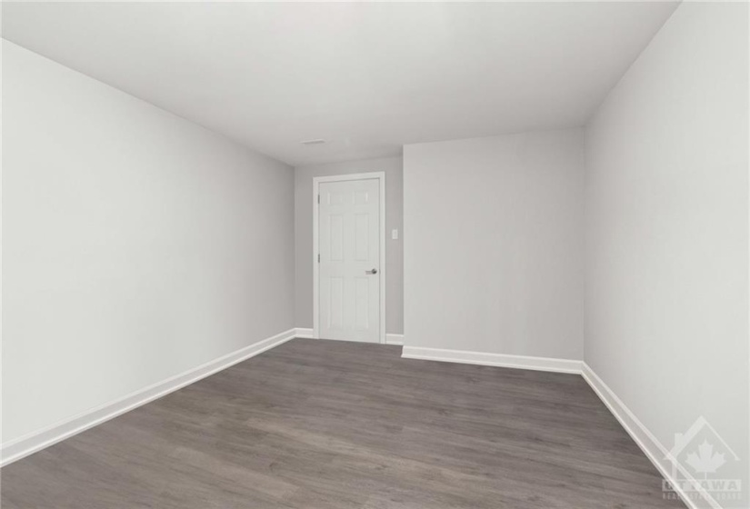 The finished basement boasts a finished room that could be used as an office, playroom or additional storage.