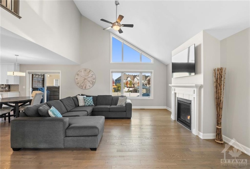 The living room boasts a cathedral ceiling.