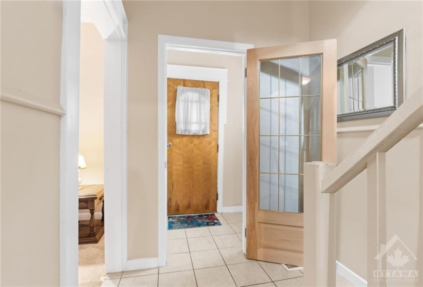 Main level tiled front foyer.