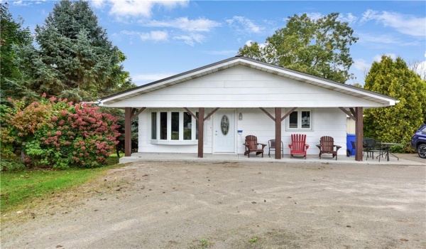 Welcome home! Beautiful covered porch. Exterior painted 2023.