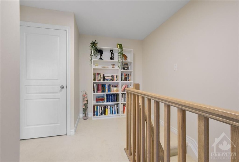 On the Builder Plan, a desk could be built into this bookshelf / nook area.