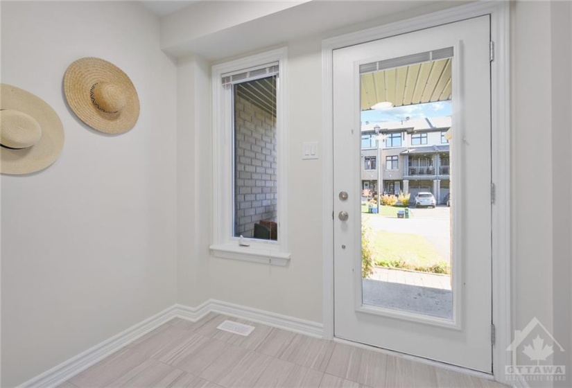 The inviting Front Foyer welcomes you into this sizable, sun filled 2 Bedroom 1.5 Bathroom Townhouse