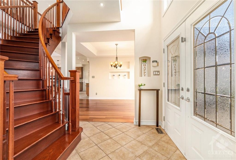 Double door entry with vaulted ceilings