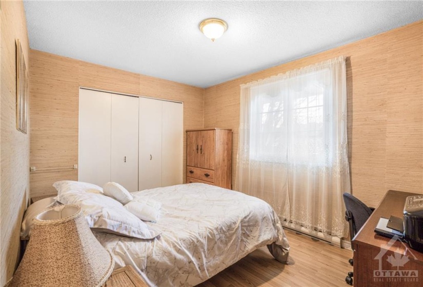 Bedroom 2 is also quite spacious and offers easy maintenance laminate flooring as there are no carpeting tru-out this fine home.