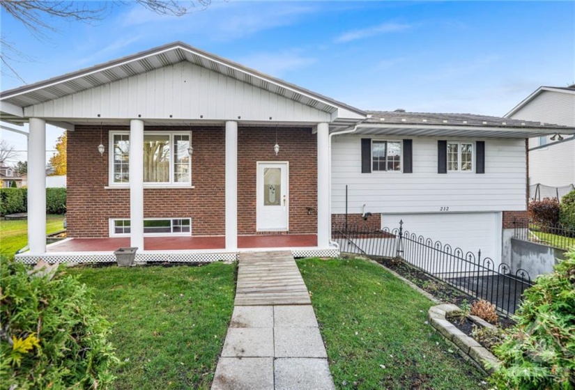 Front view of this ''stately'' looking home on corner lot.