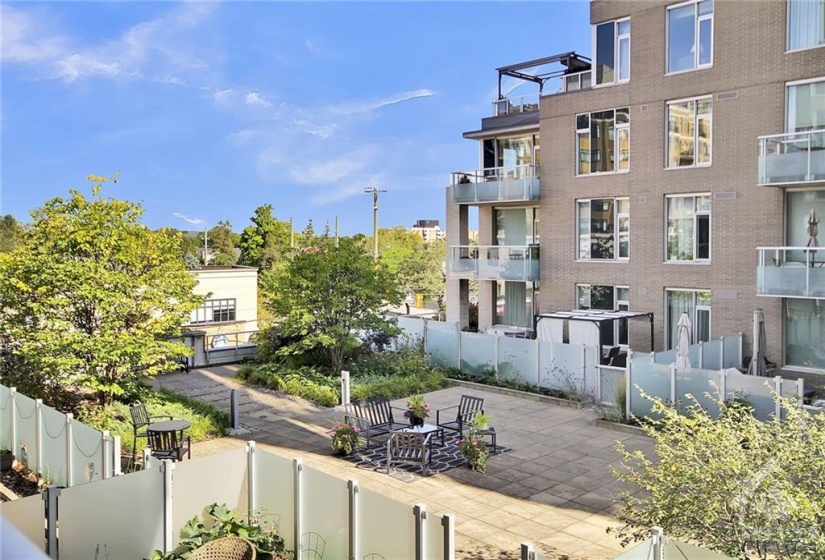 Balcony view of the large shared outdoor patio area.