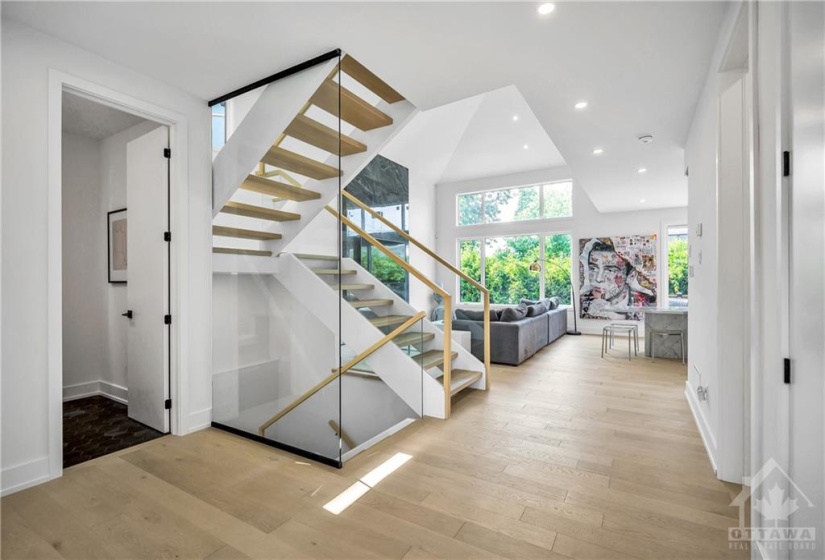 Glass railings and floating stairs