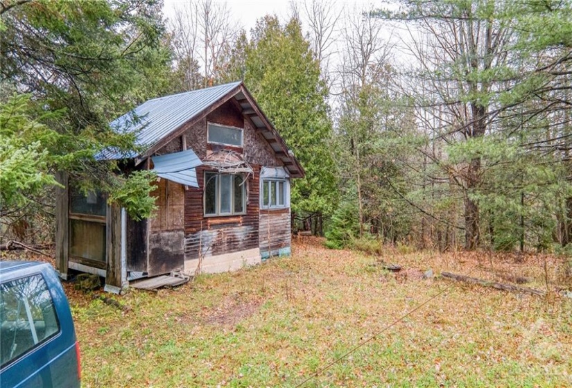 One and a half story bunkie with terrific potential