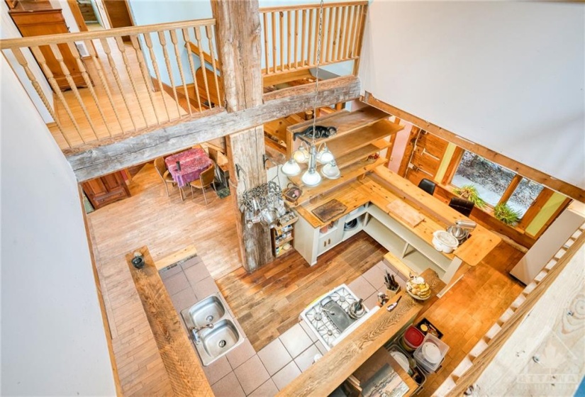 View of kitchen from the loft large work area