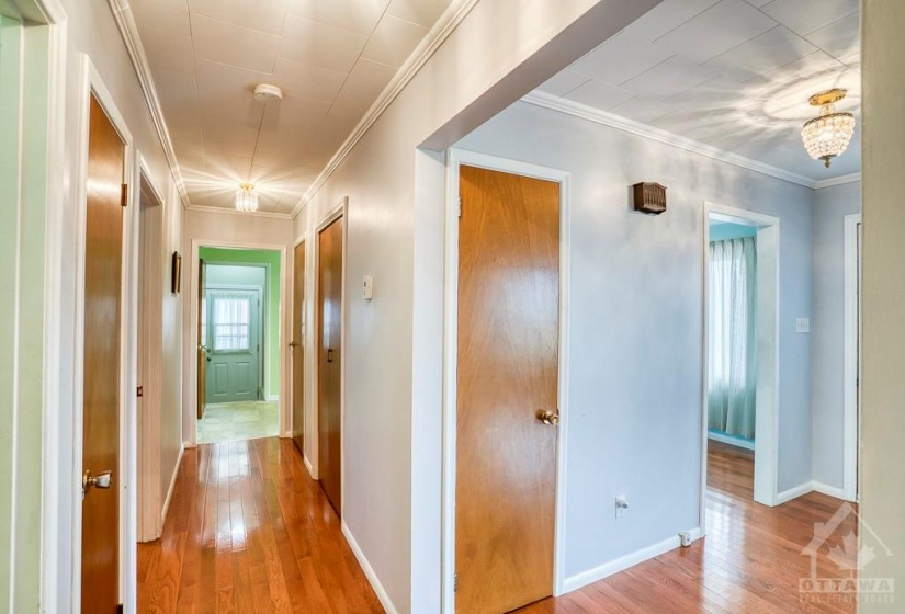 Hallway - Foyer on the right, Carport door at the end of the hall