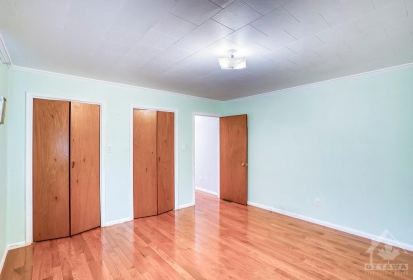 Primary bedroom at the back corner of the house