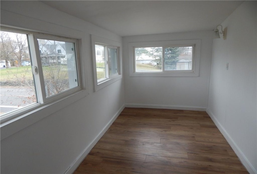 Sunroom/storage/walk-in from primary bedroom