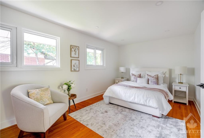 Primary Bedroom with Large Window & Charming Closet