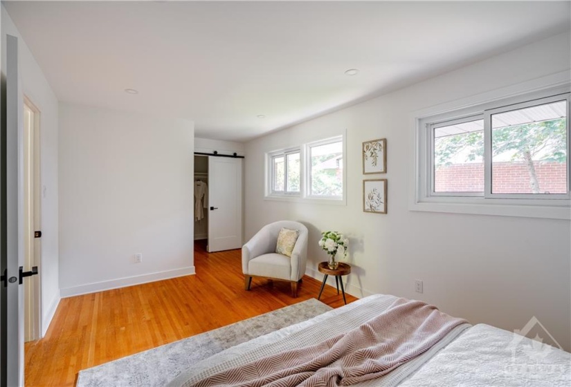 Primary Bedroom with Ample Natural Light and a Closet with Charm!