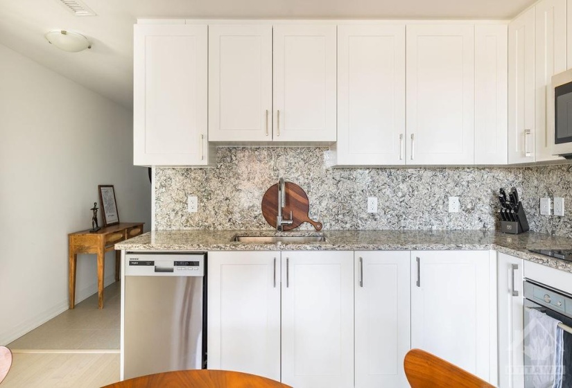 Quartz counters and backsplash.