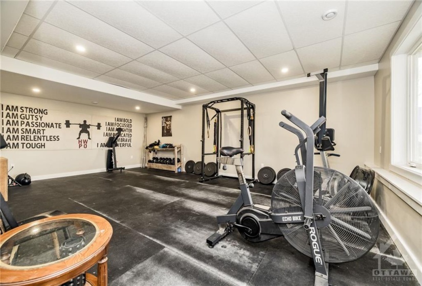 Lower Level Gym with waterfront view